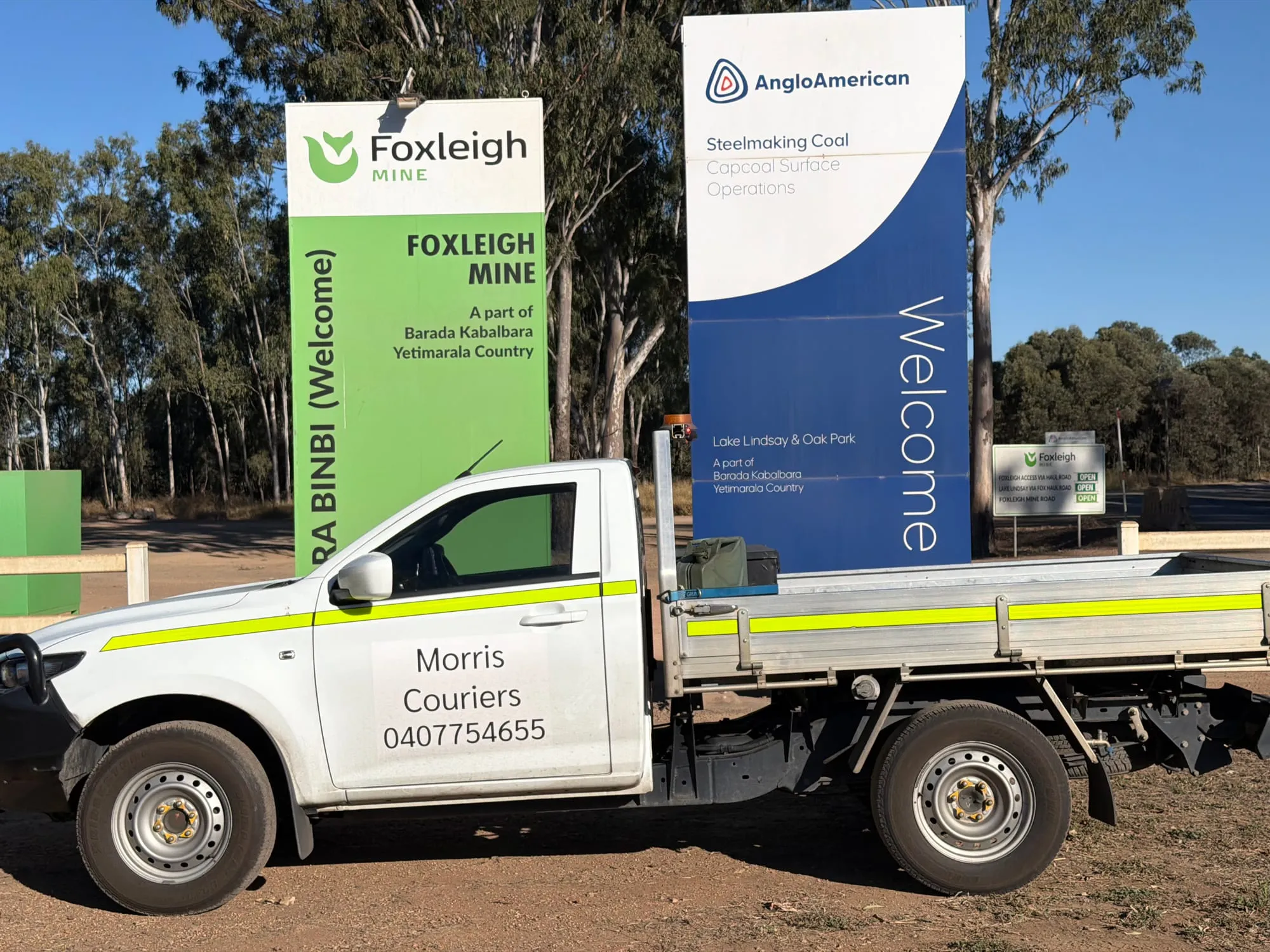 The Morris Couriers ute with its tray down at a Central Queensland mine gate.